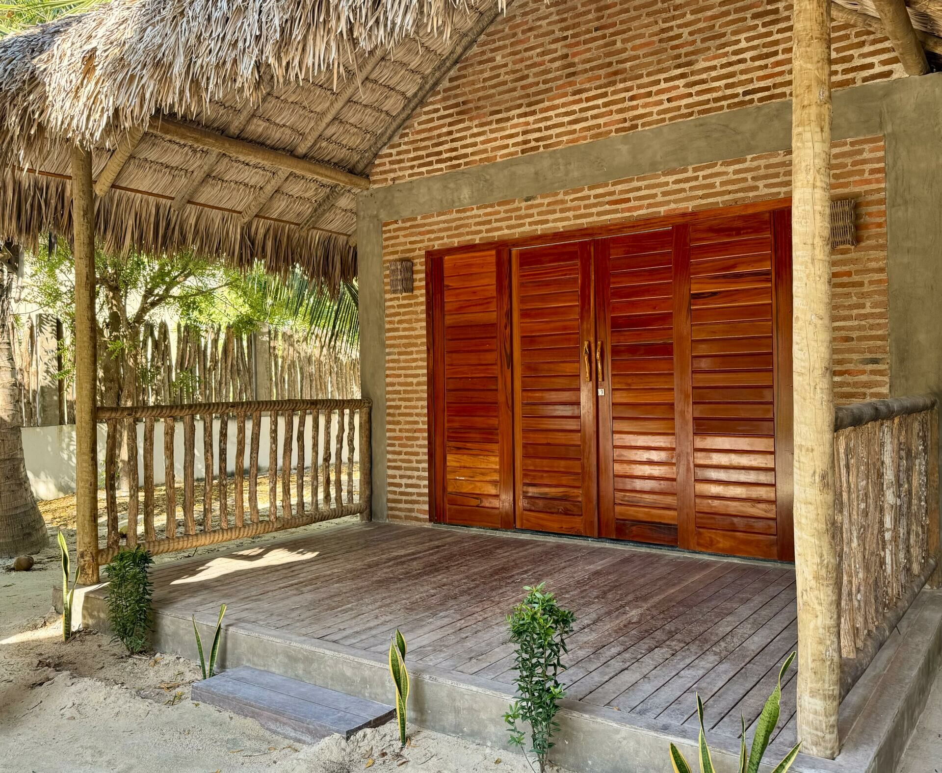 Imagem de Vila rústica com diversas acomodações e piscina no Preá